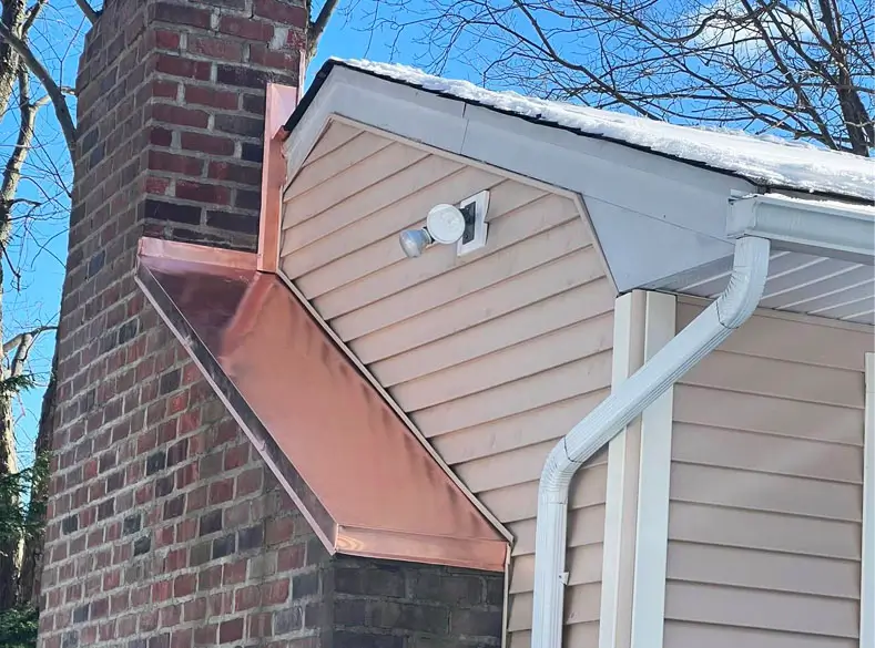 Copper chimney reflective roof plate.