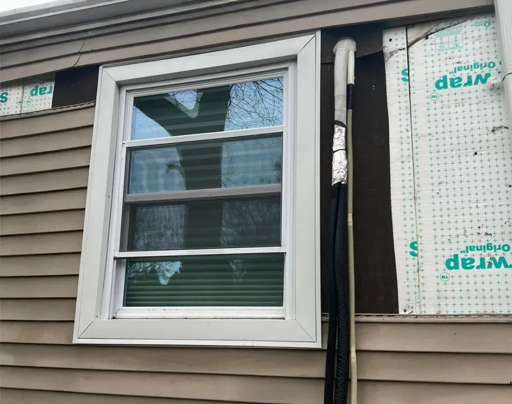 Siding and window installation.